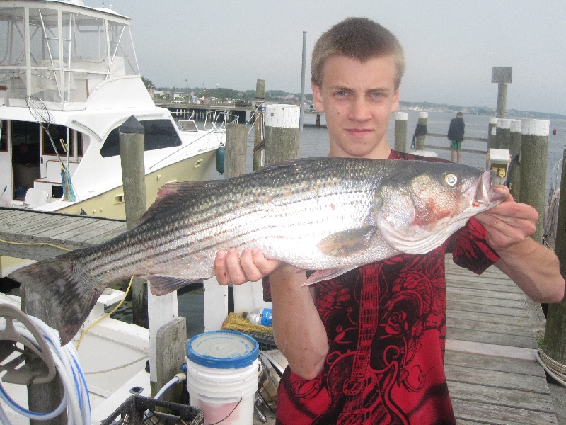 Andrew with his first keeper striper.