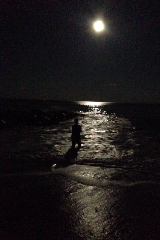 me casting the surf at night