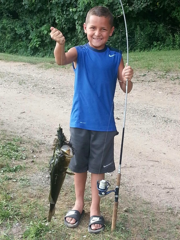 My son Derek with his First largemouth bass of this year