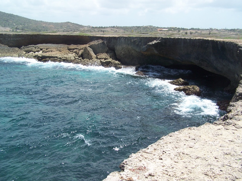 SIDE VIEW OF THE CLIFFS WHERE I FISHED IN ARUBA