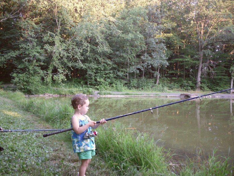 my little daughter trying to catch some fish